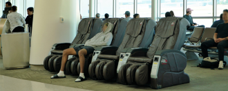Person in massage chairs
