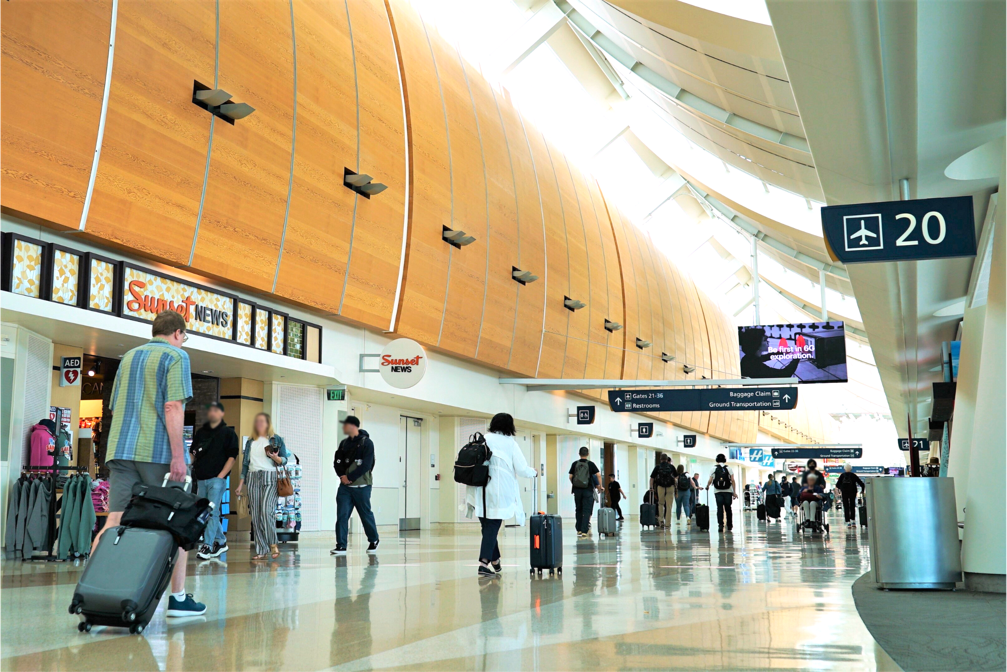 passengers walking in terminal b