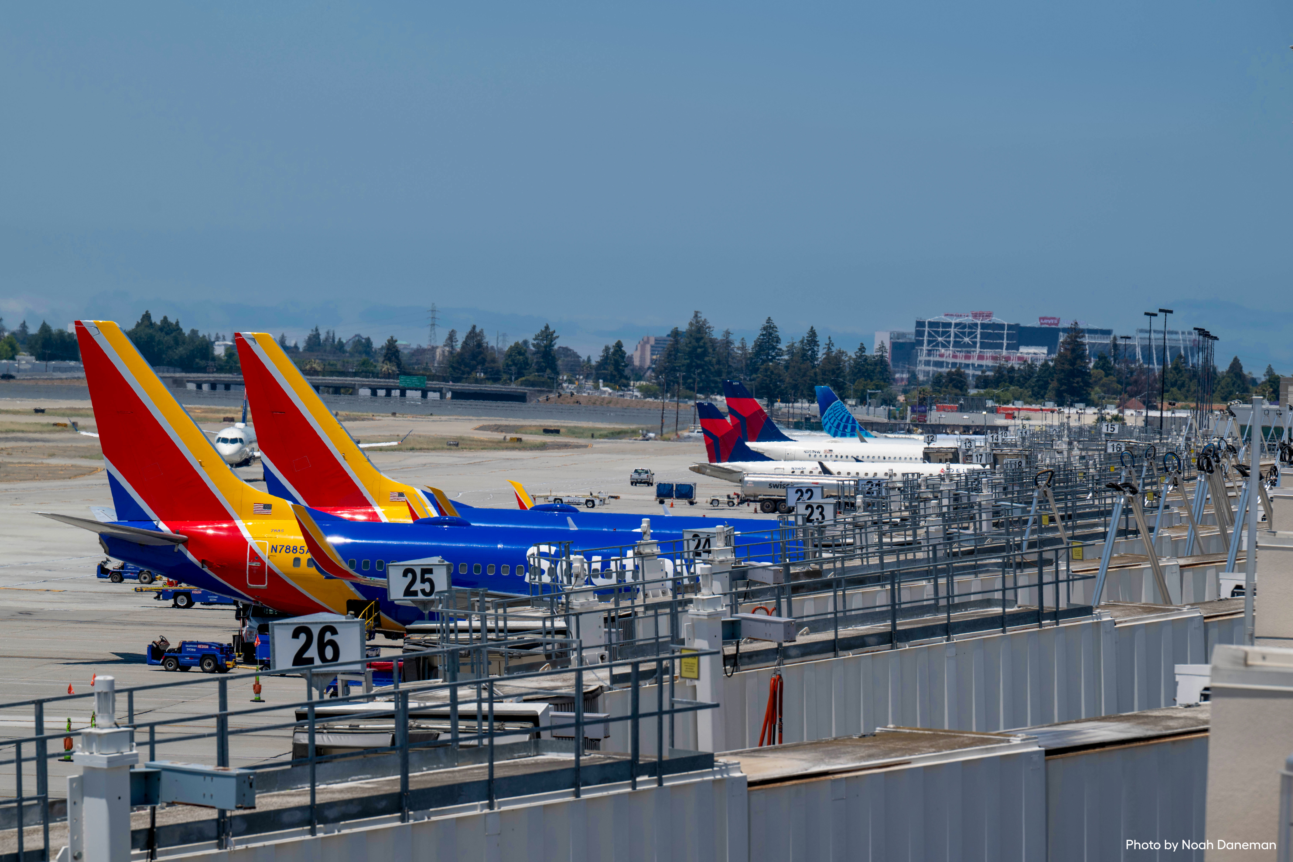 airplanes in front of Levi's Stadium at SJC 