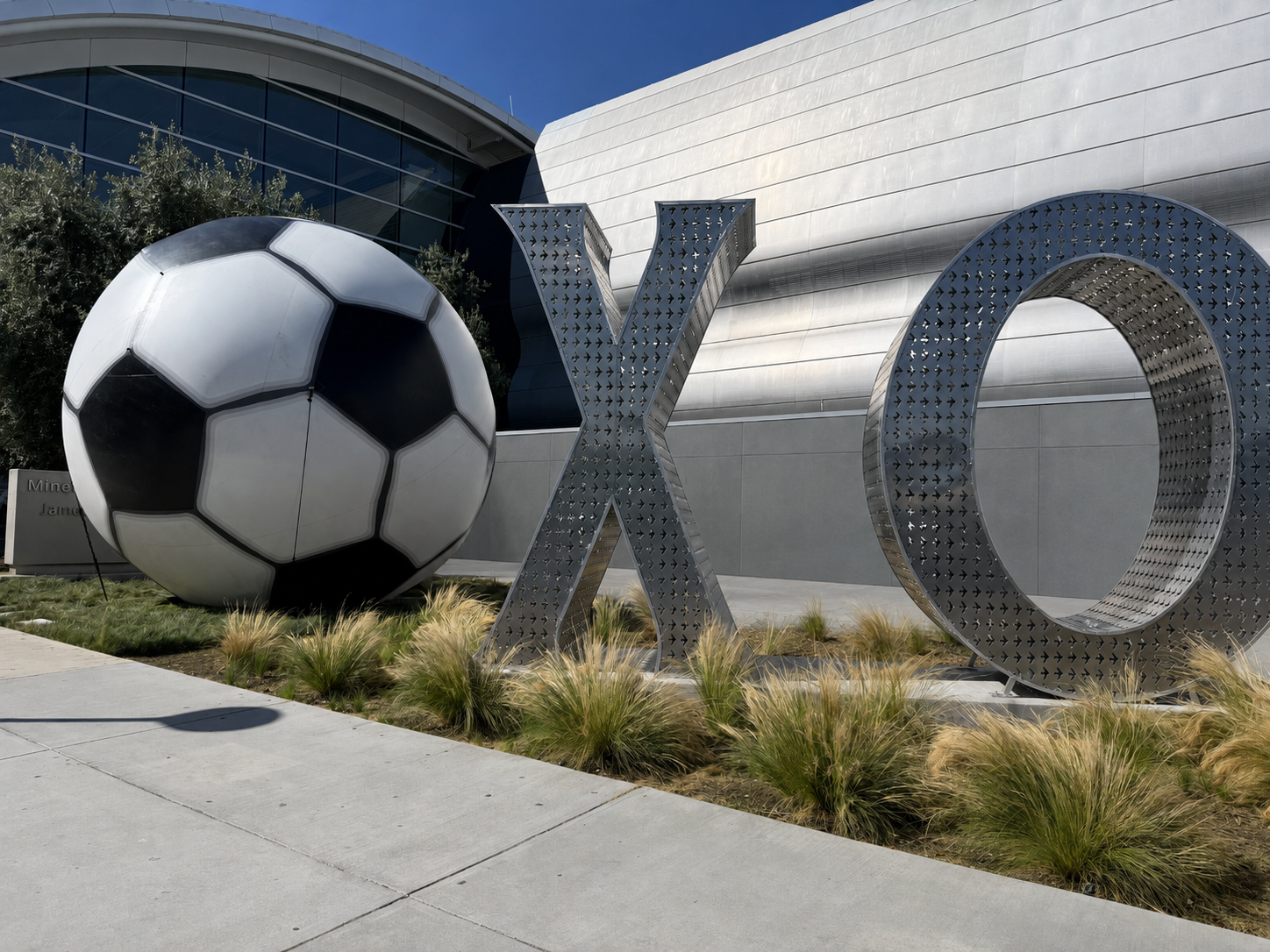 20 ft. soccer ball next to XO sign in terminal B