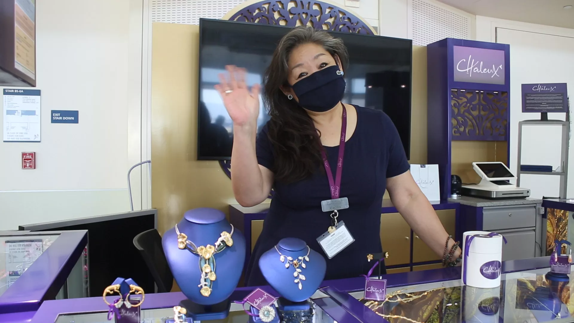 Chief Gemologist Cecilia Wong welcomes passengers to Chaleux