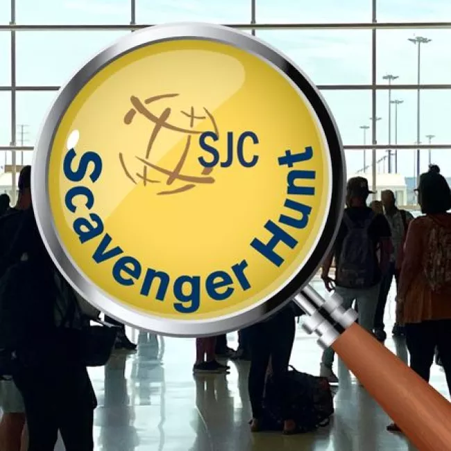 Image of Magnifying glass in terminal. Text says "SJC Scavenger Hunt."